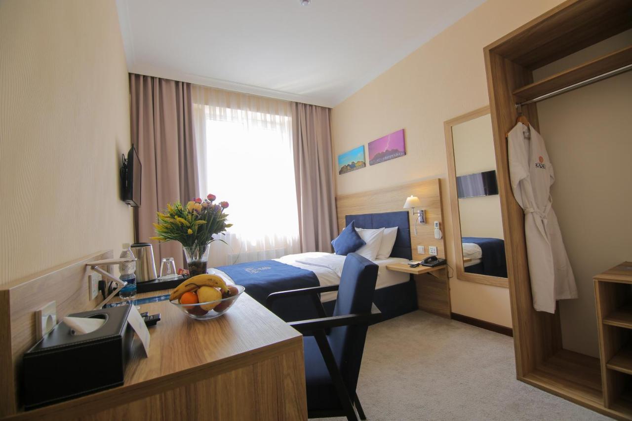 Rayan Hotel Osh Bagian luar foto